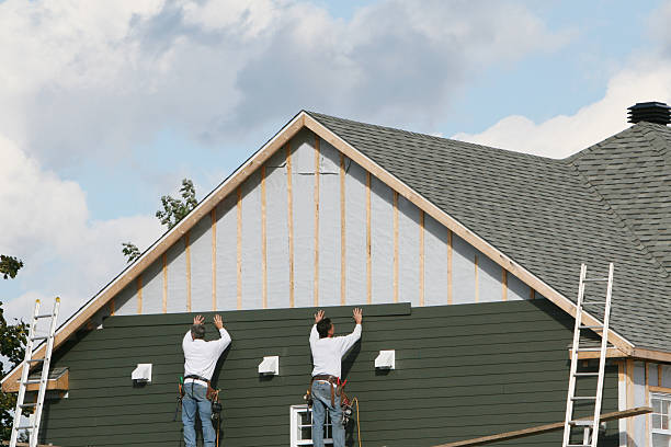 Professional Siding Installation technician working in Brewster, OH